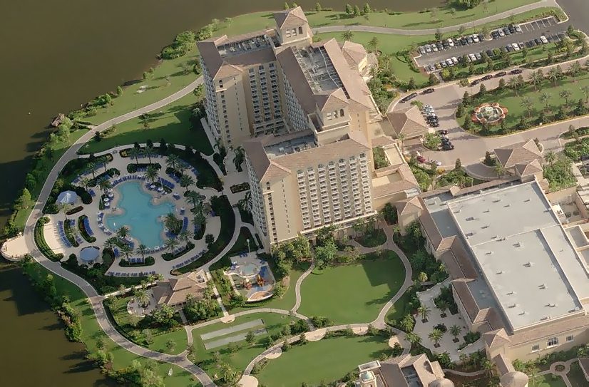 Past Projects: An aerial view of a large hotel and golf course.