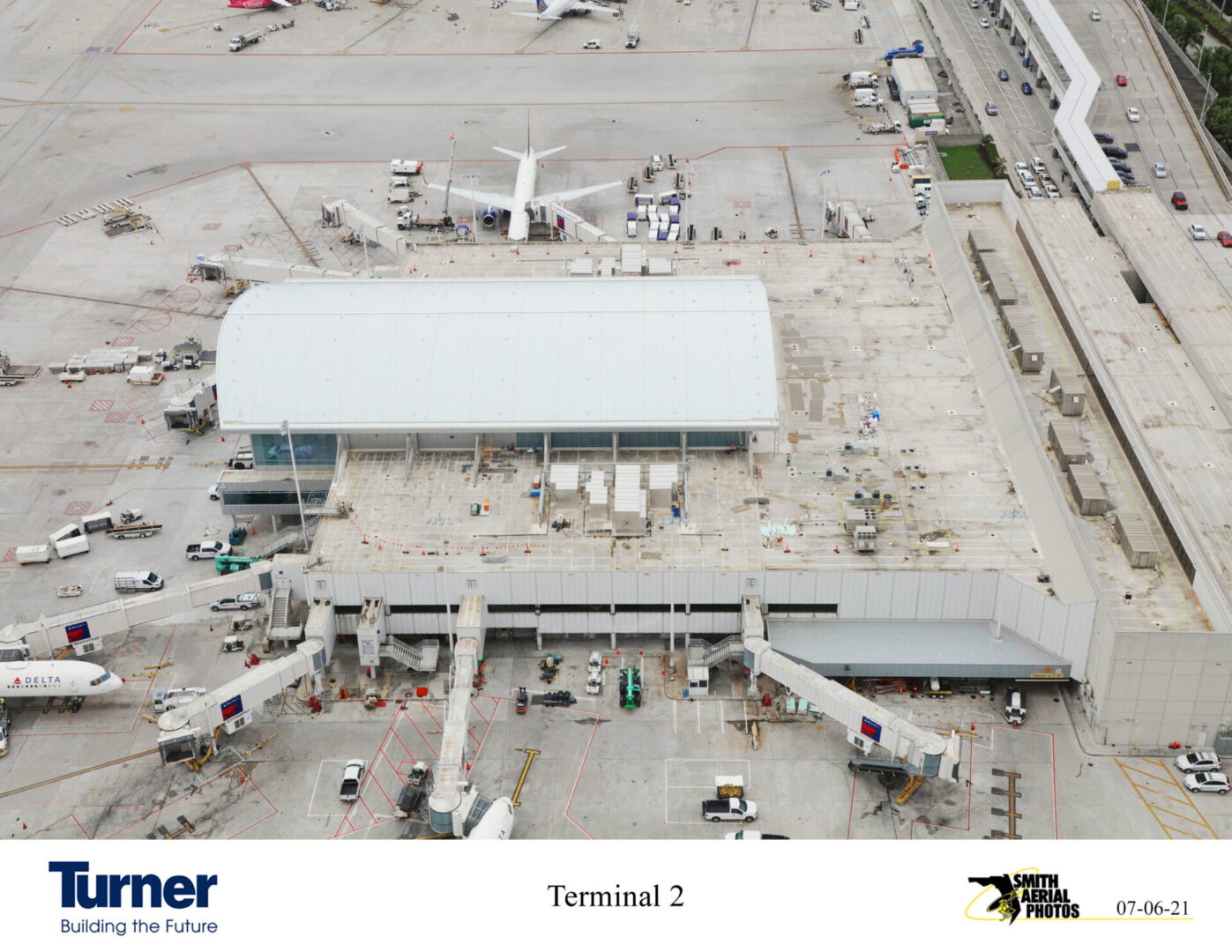 An aerial view of a airport terminal showcasing past projects.